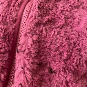 Purple Northface jacket.